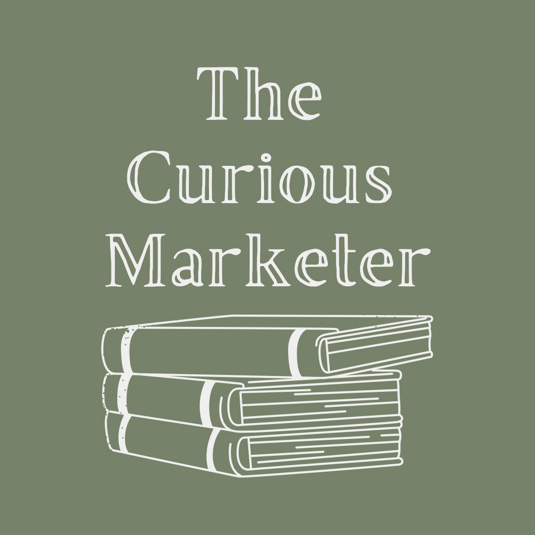 The Curious Marketer logo