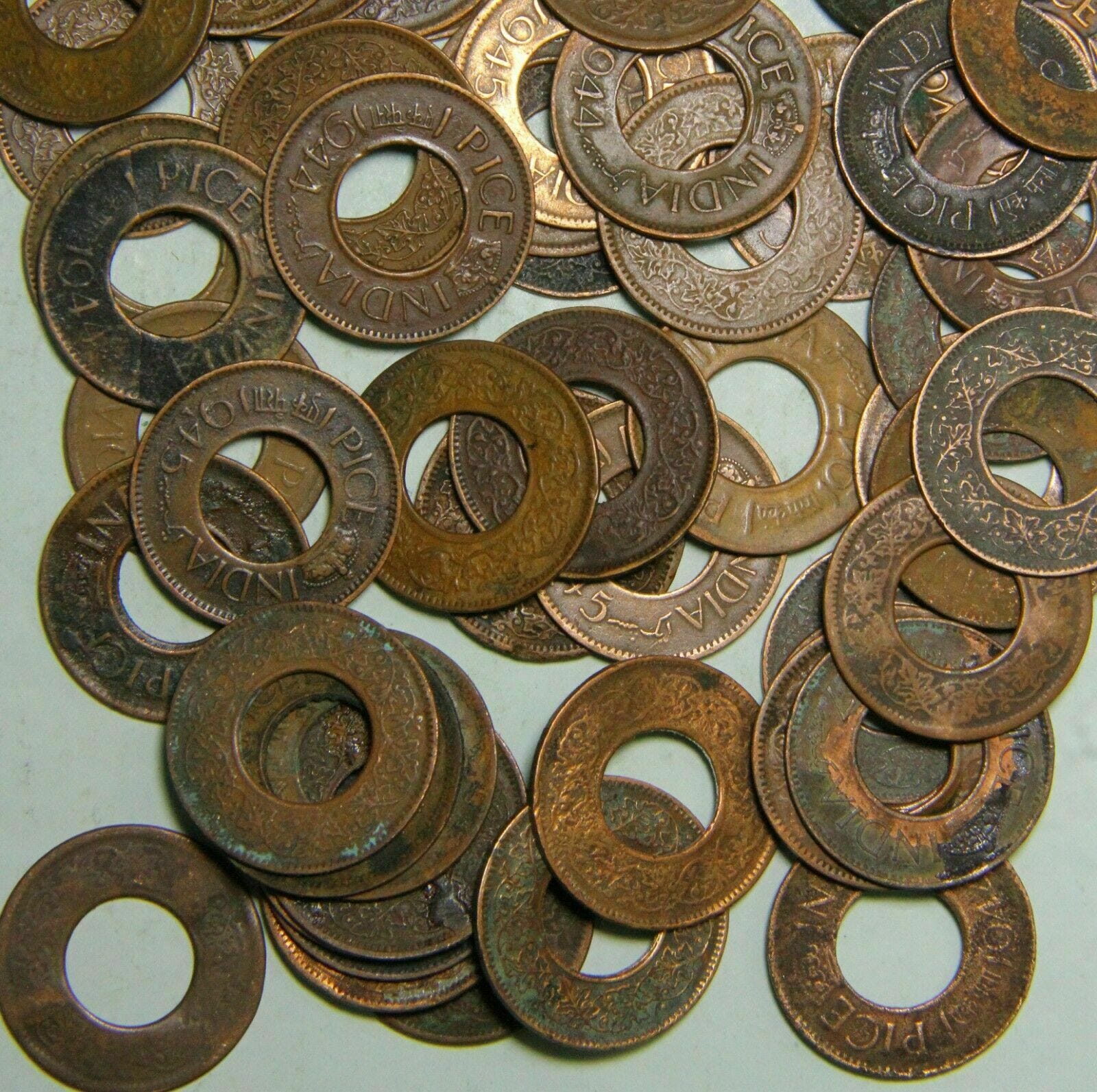 Those Old Coins with Holes in Them? - Brown History