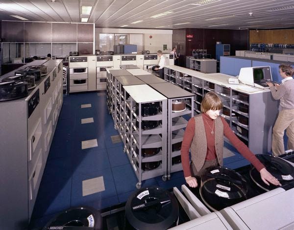 an IBM database admin mixing on a turntable in order to perform a join query
