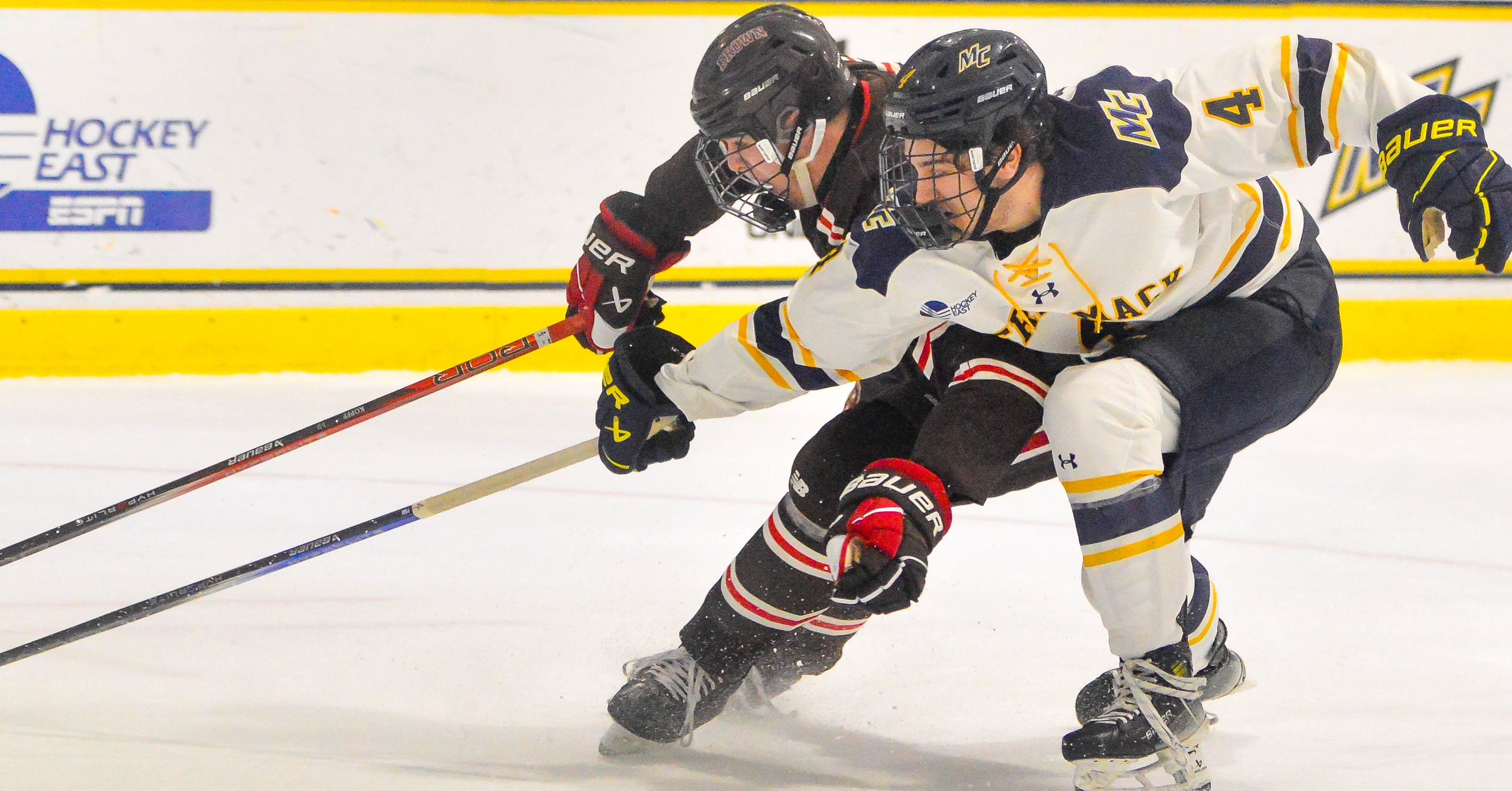 Brown gets to the net and pulls away from Merrimack