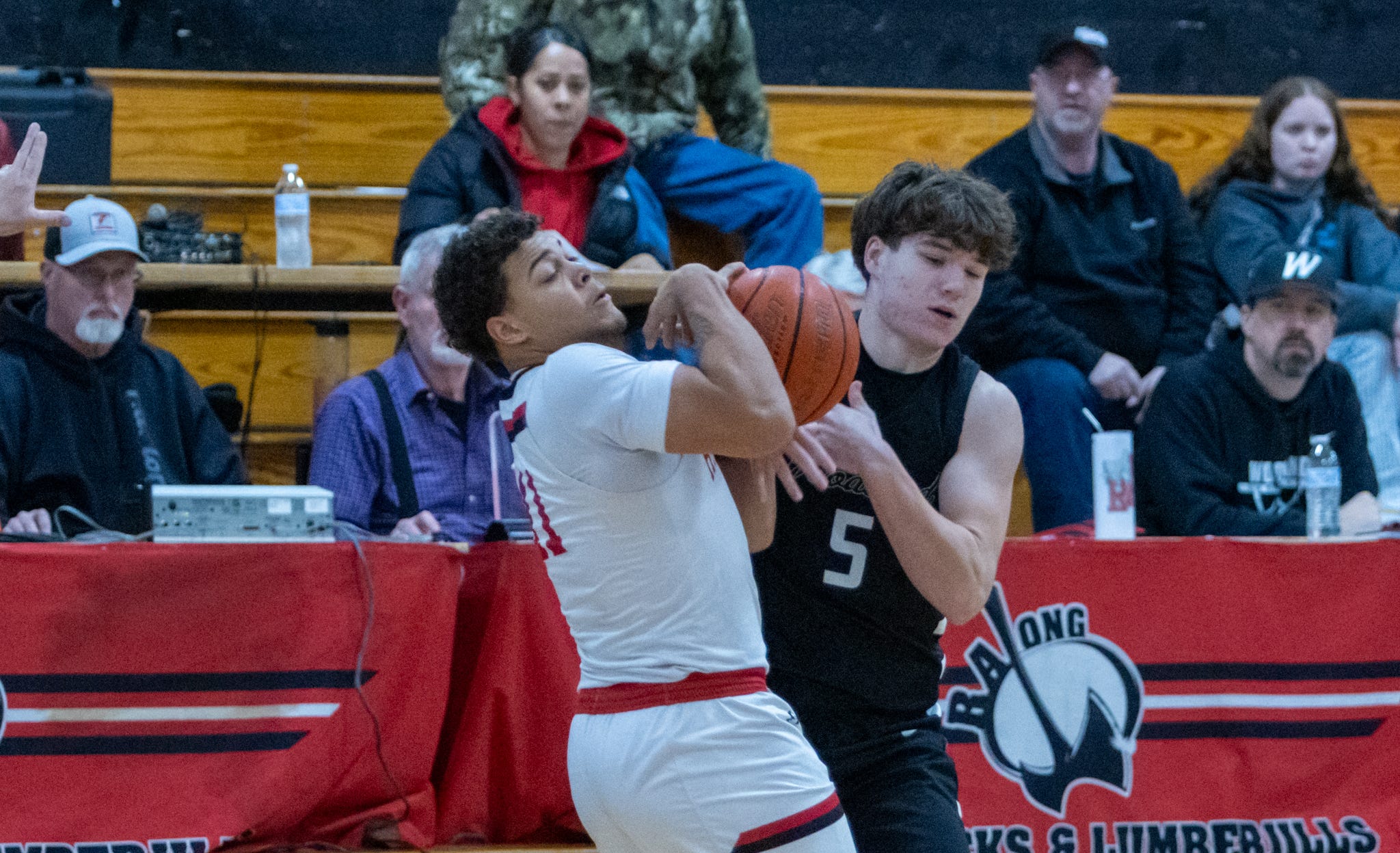 2A Prep Boys Basketball: R.A. Long starts quick, wallops Woodland