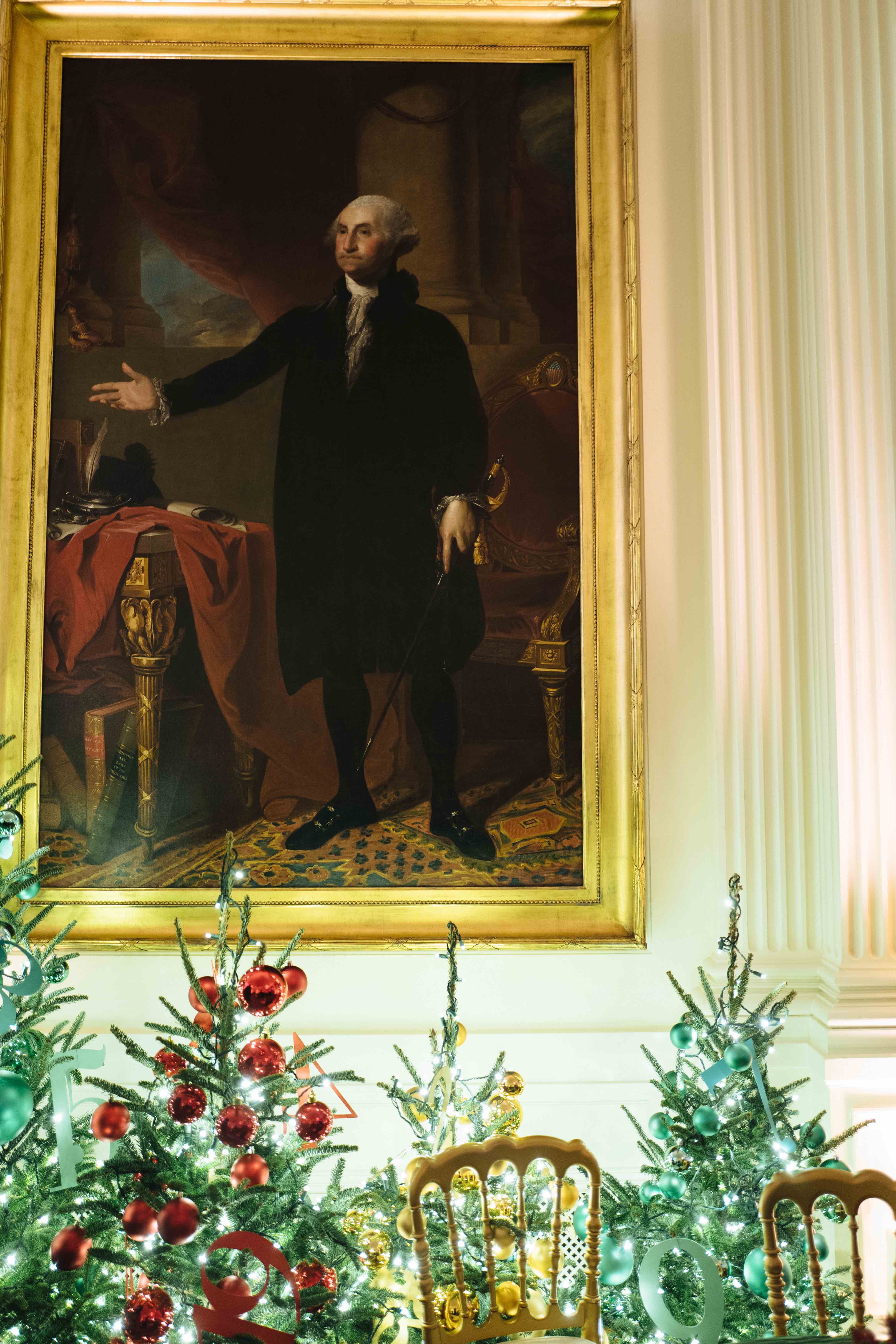 Christmas trees and garland in the Grand Foyer as the 2022 White House  Christmas decorations are