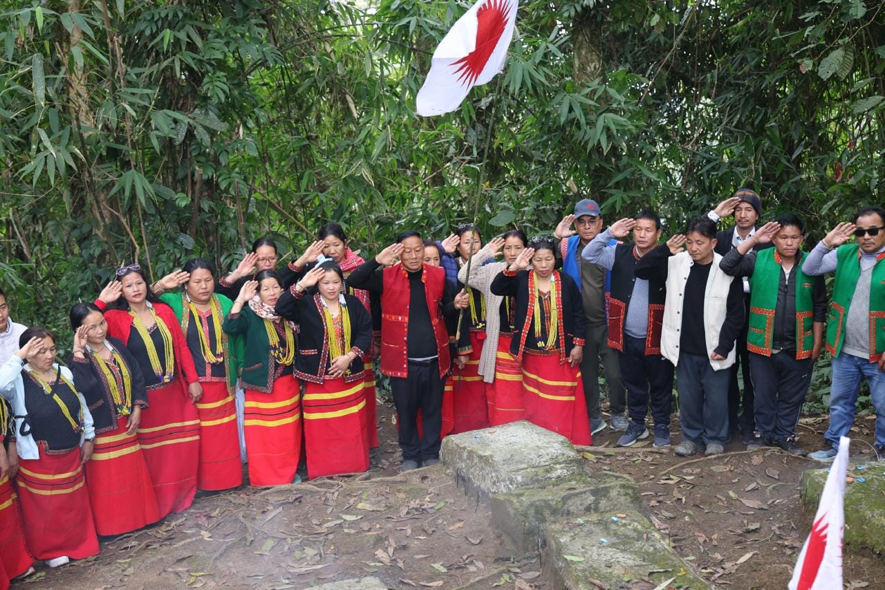 Adi community members from Tuting salute fallen Indian soldiers at Kapang La, site of a 1962 battle in Arunachal Pradesh.