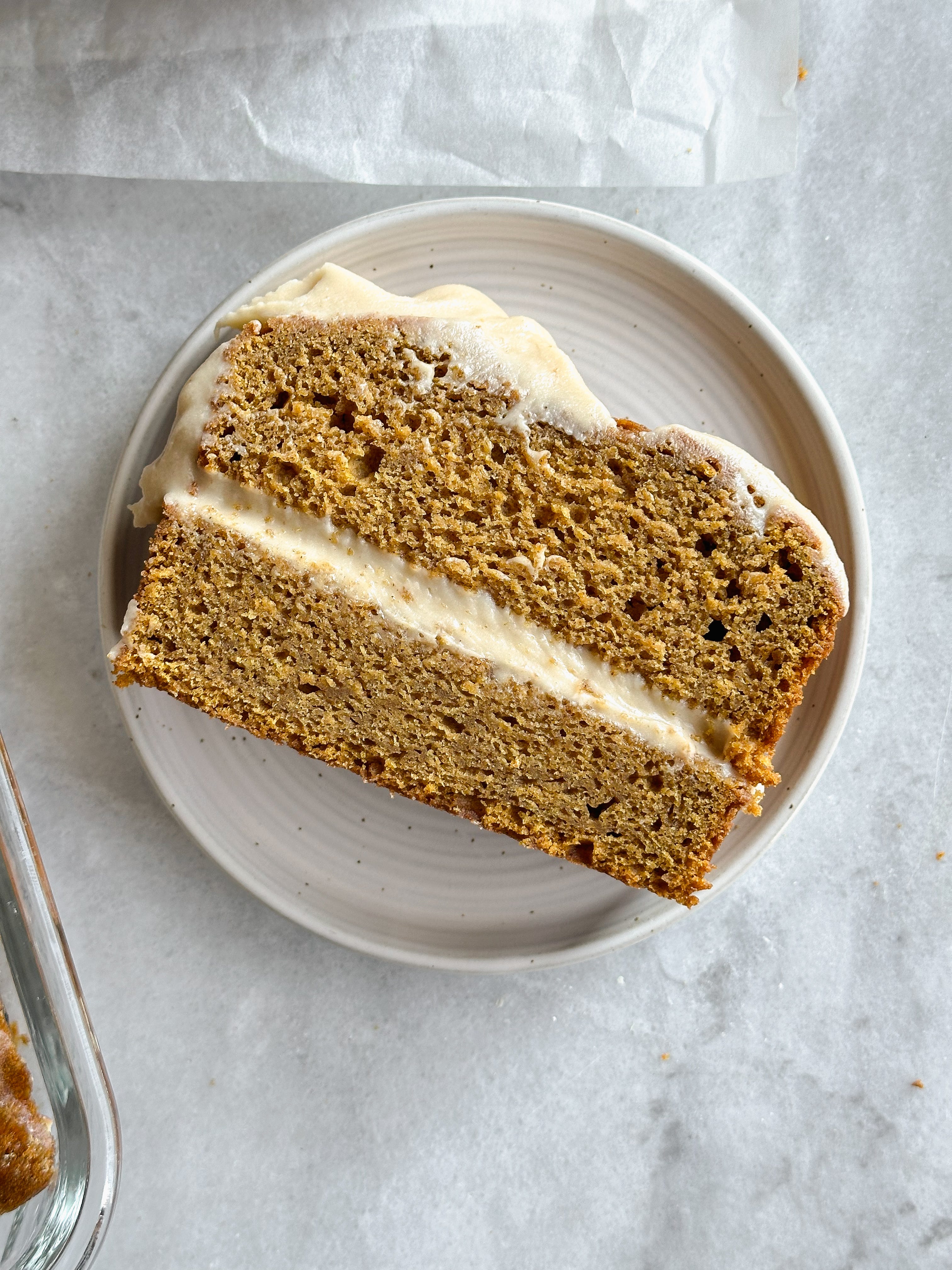 Pumpkin bread with brown butter cream cheese frosting and pepita brittle