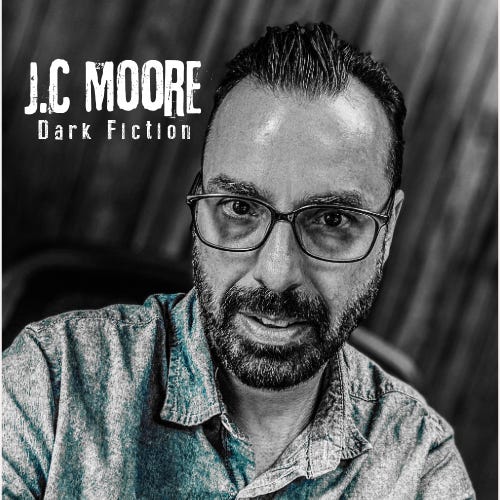 J.C. Moore's Musings From The Writing Cave  logo