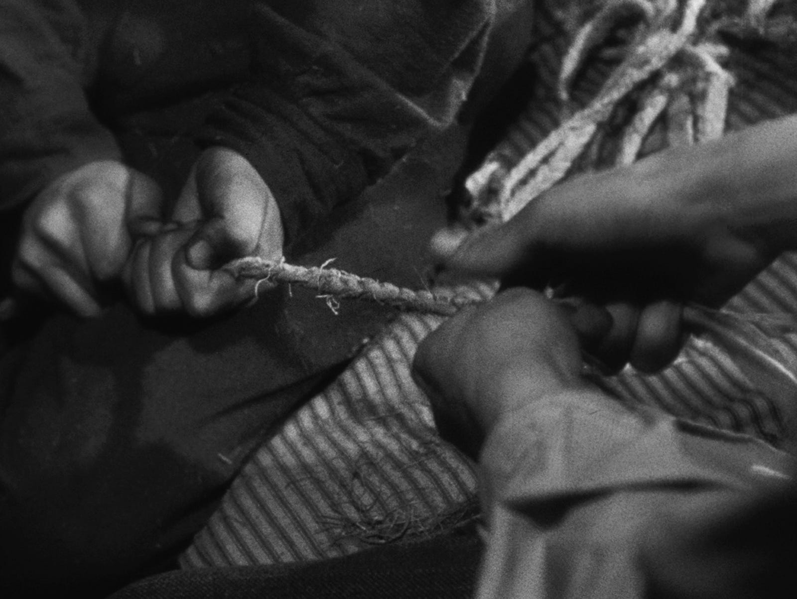 A Man Escaped  (1956) by Robert Bresson. This is the best prison