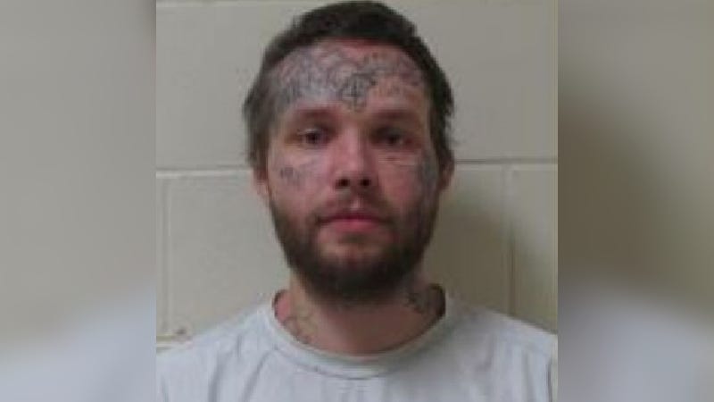 Inmate denies threat to kill police dog