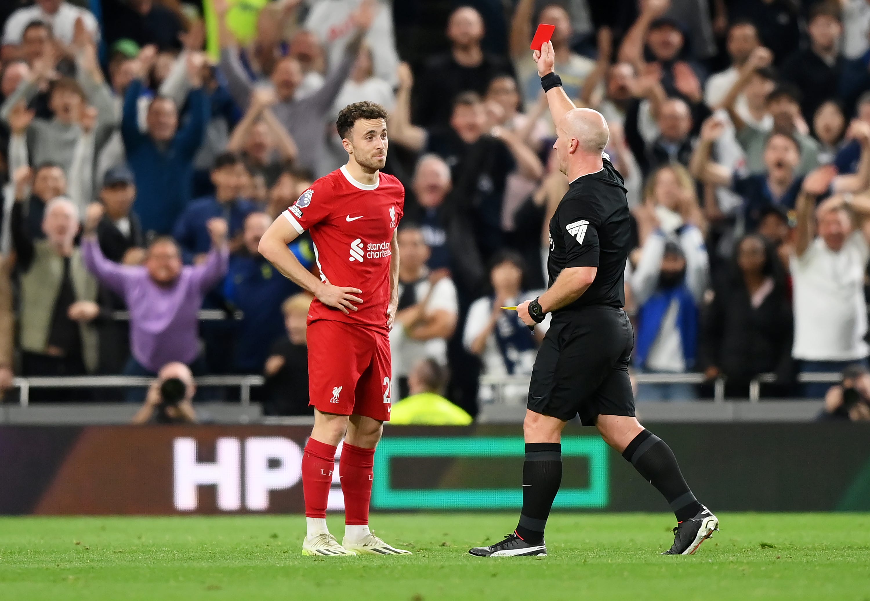 A Referee Holding Up A Red Card High-Res Stock Photo - Getty Images