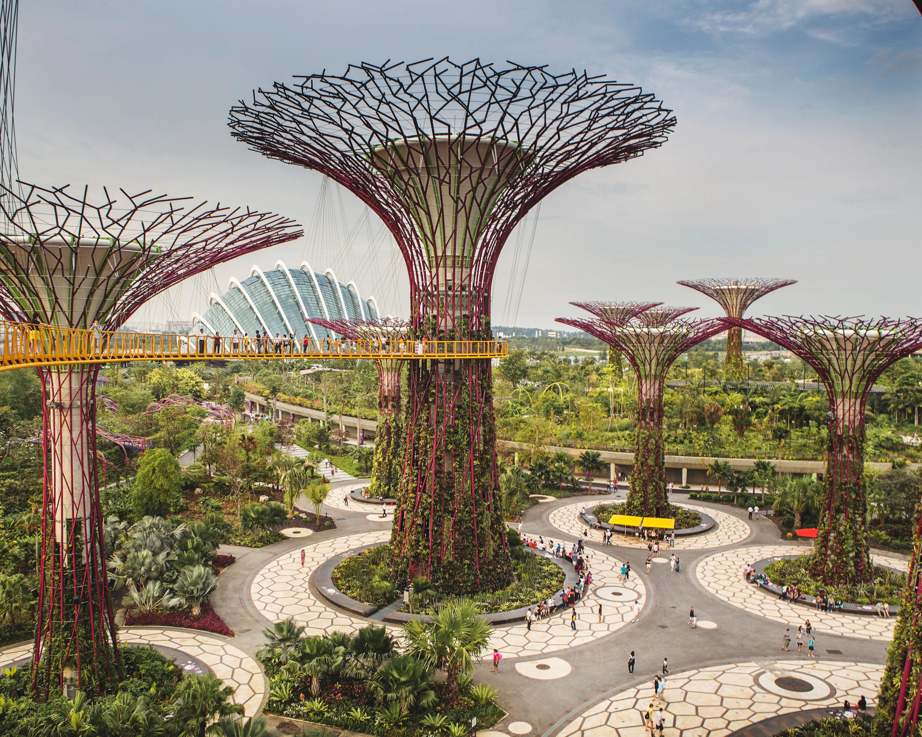 Futuristic green solarpunk city with lots of trees