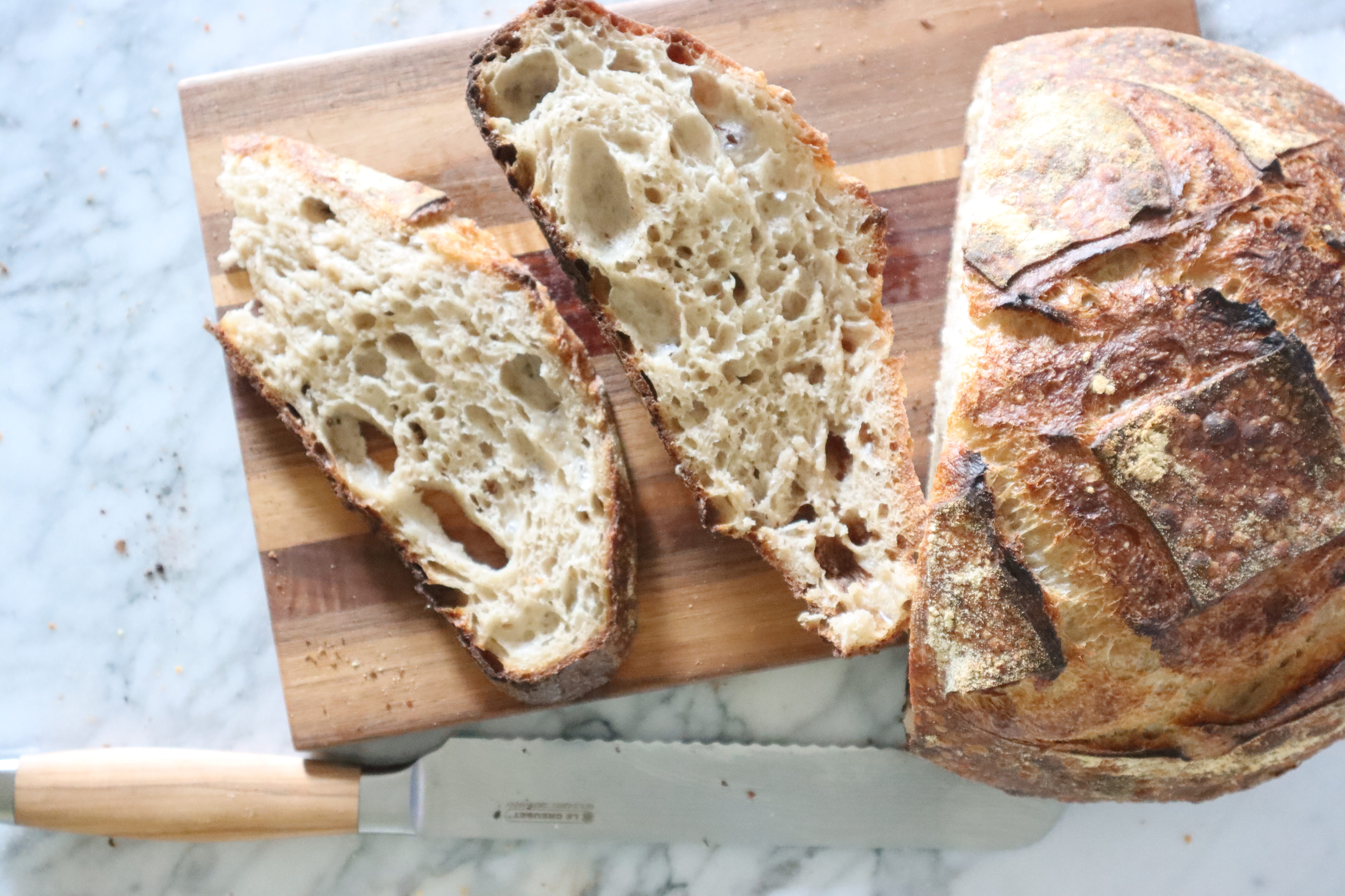 I bought a Challenger bread pan and just baked my best two loaves ever. I  love it! Tartine Country Bread recipe, see link : r/Sourdough