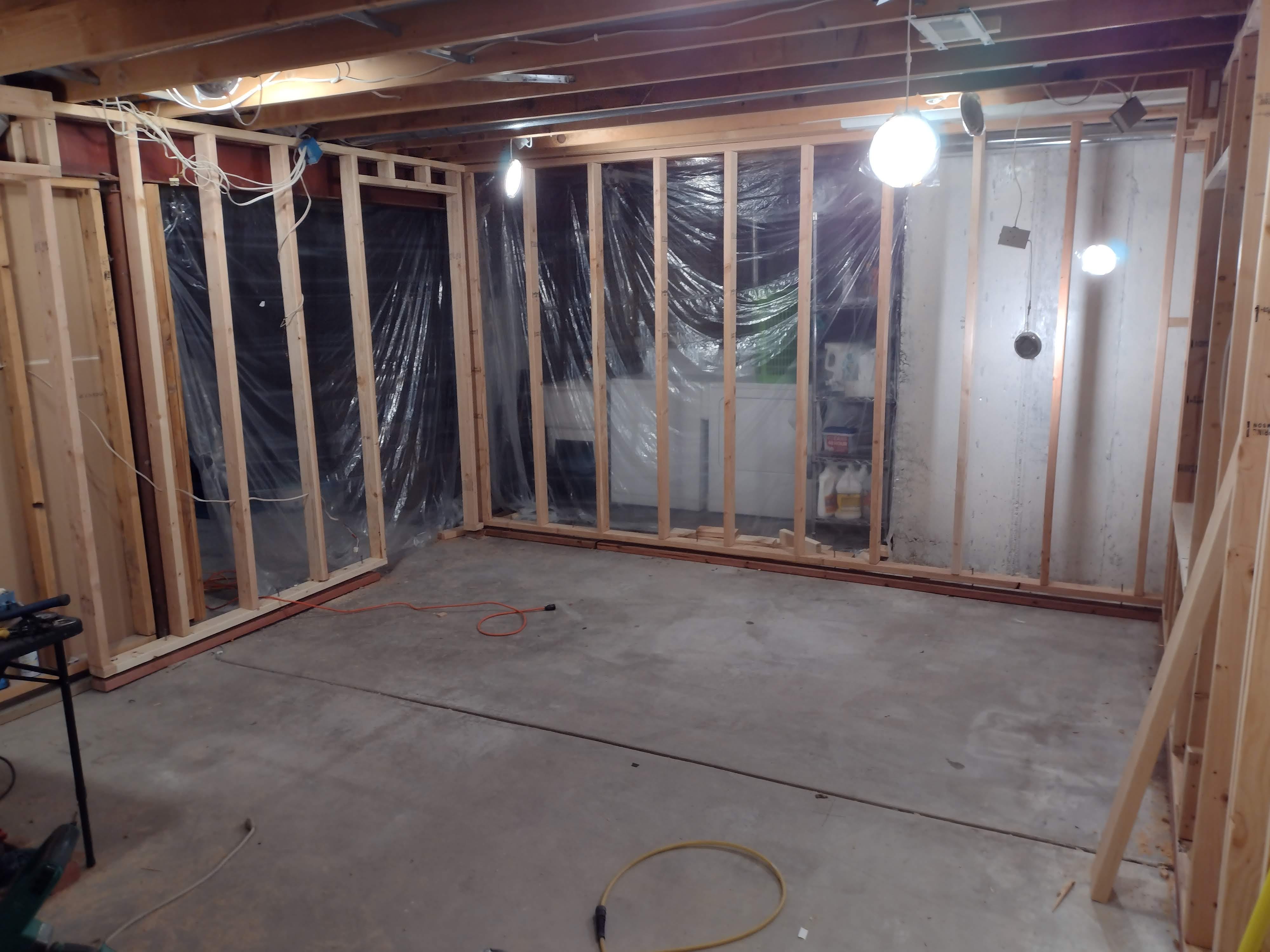 Framing an interior basement door in a floating wall - Home