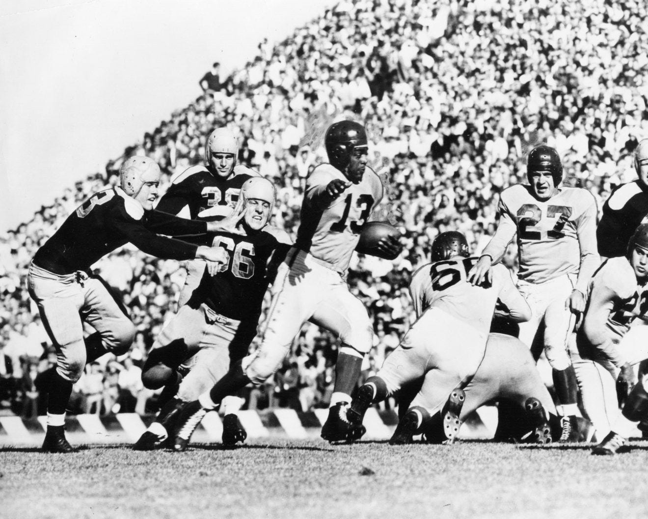 Kenny Washington, who broke the NFL's color barrier, was nearly  forgotten—unlike Jackie Robinson, his UCLA teammate.