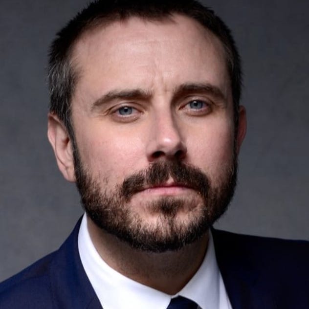 Jeremy Scahill logo