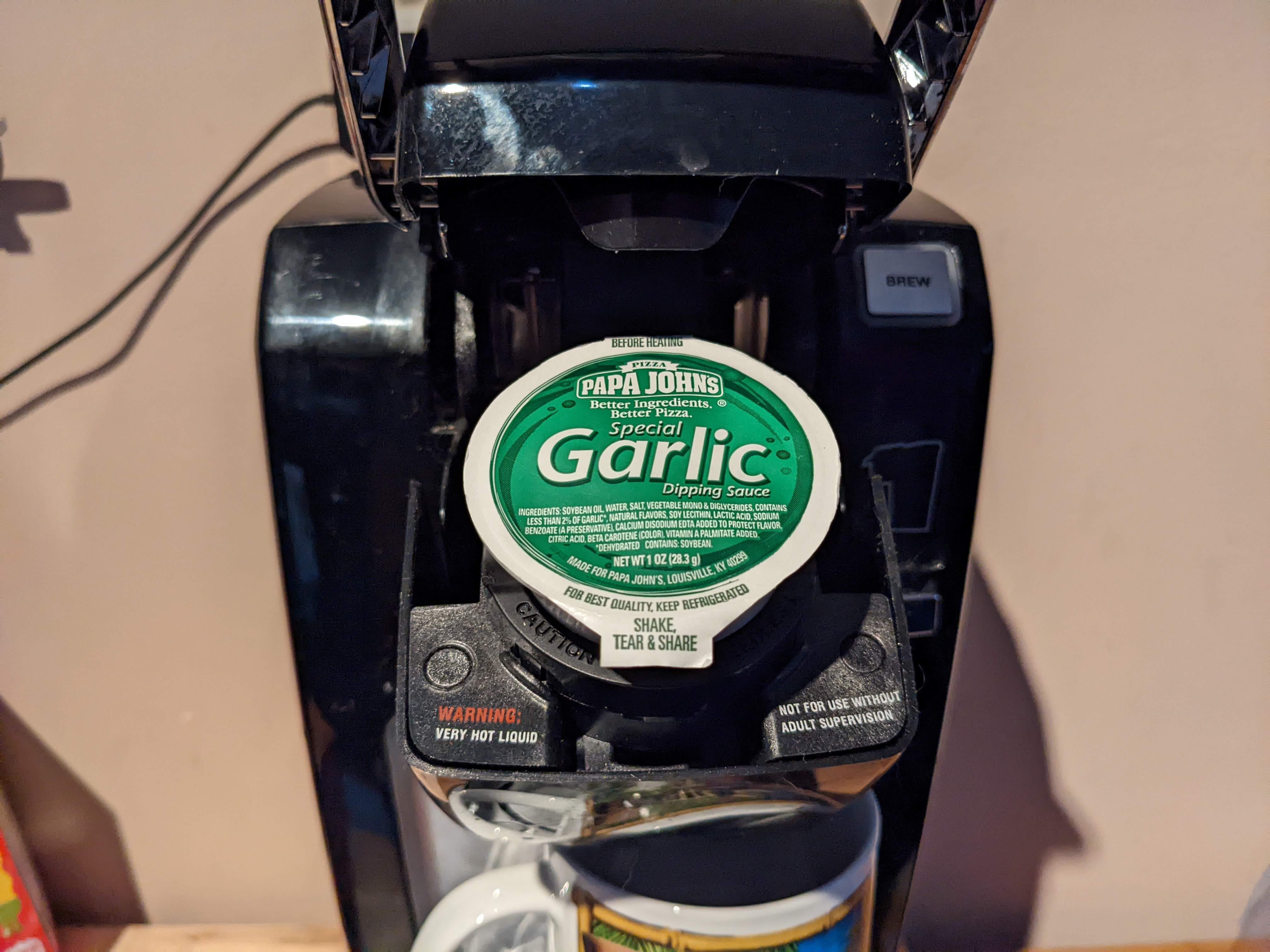 Can you brew a Papa Johns garlic cup in a Keurig machine?