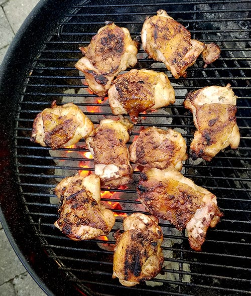 Chicken thighs on charcoal grill sale