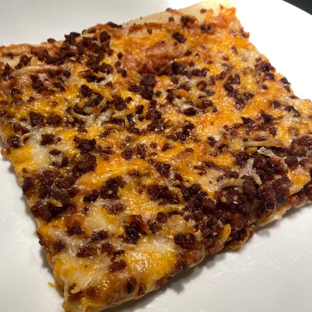 School lunch mexican top pizza