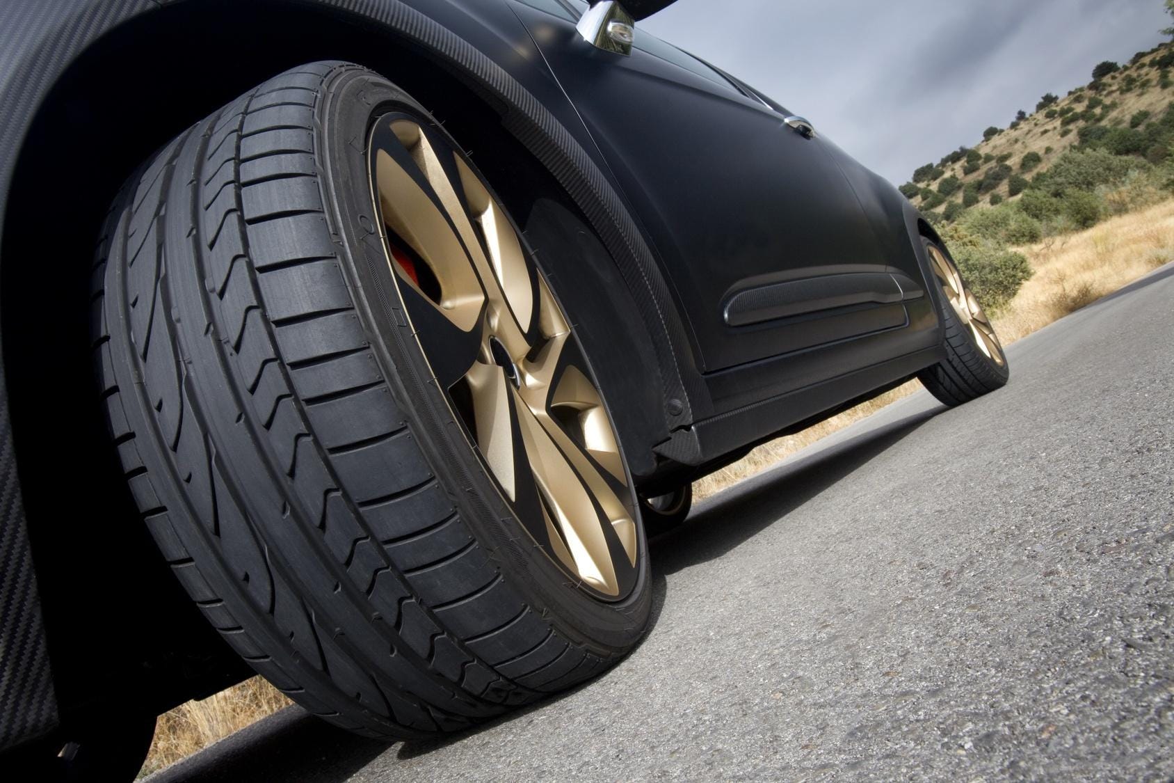 Why aren't tires made of solid rubber instead of filled with air?