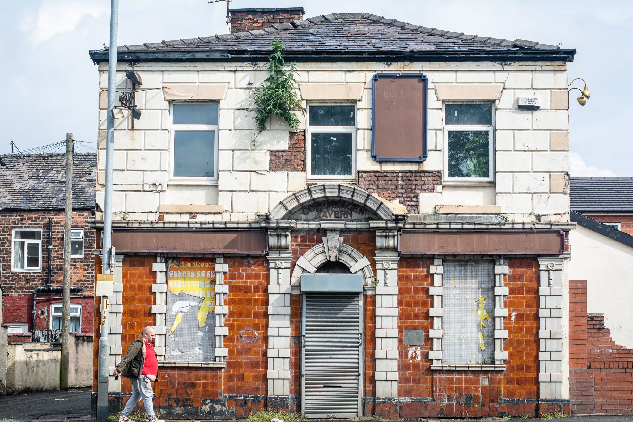 Memories and regrets in the ghost pubs of Oldham Road