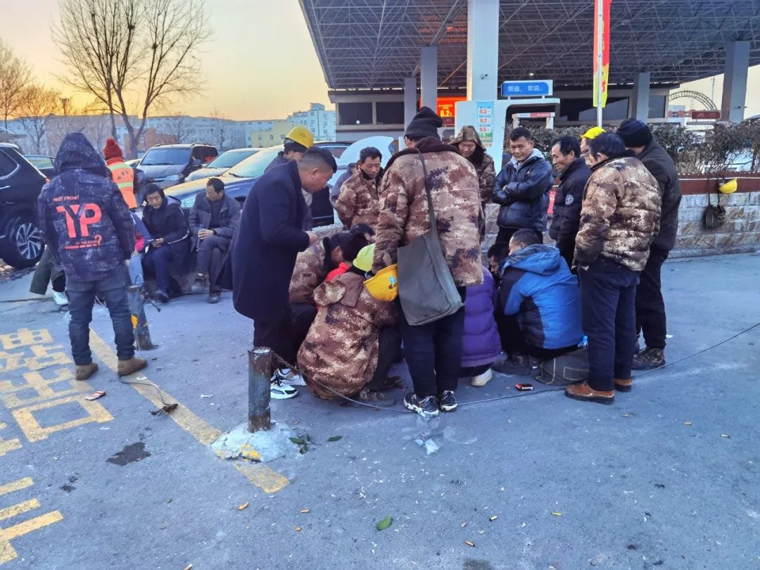Migrant Workers Waiting for Work by the Roadside in the Early Morning