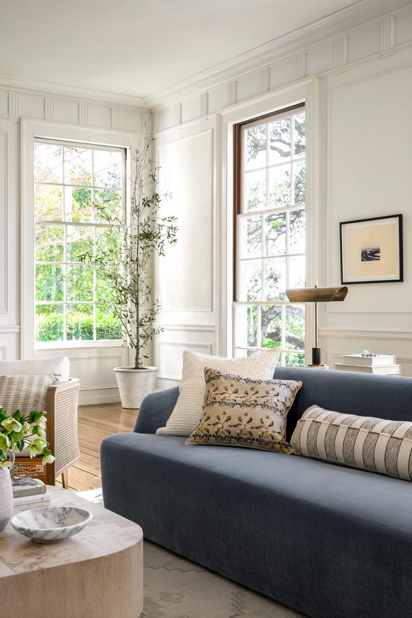 Farmhouse living room with blue couch deals