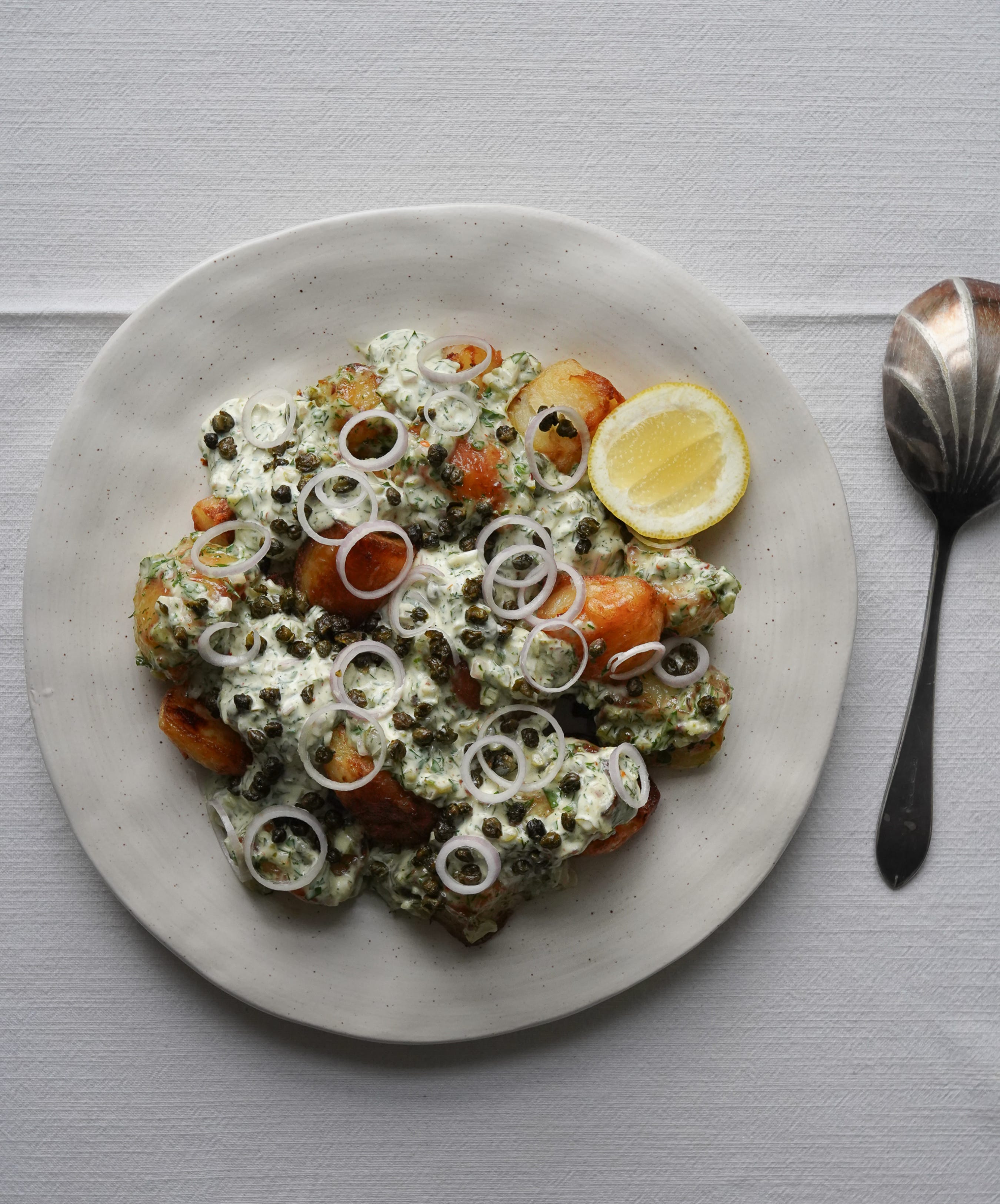 Crispy potato salad with a caper, cornichon & dill dressing