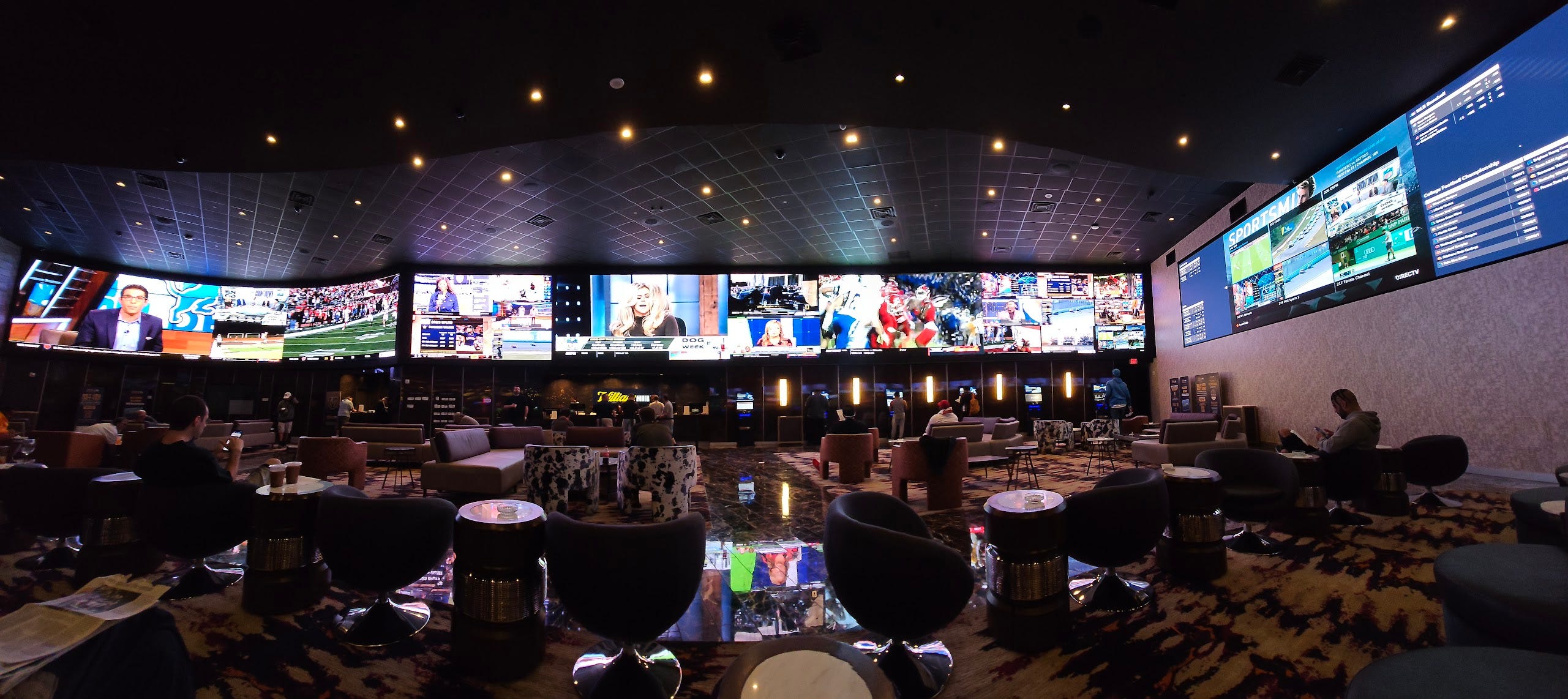 An NFL Sunday in a Las Vegas Sportsbook by Arif Hasan