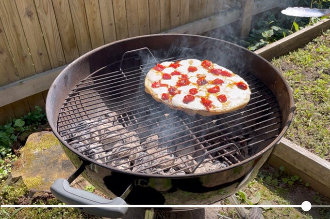 Cooking pizza on weber top