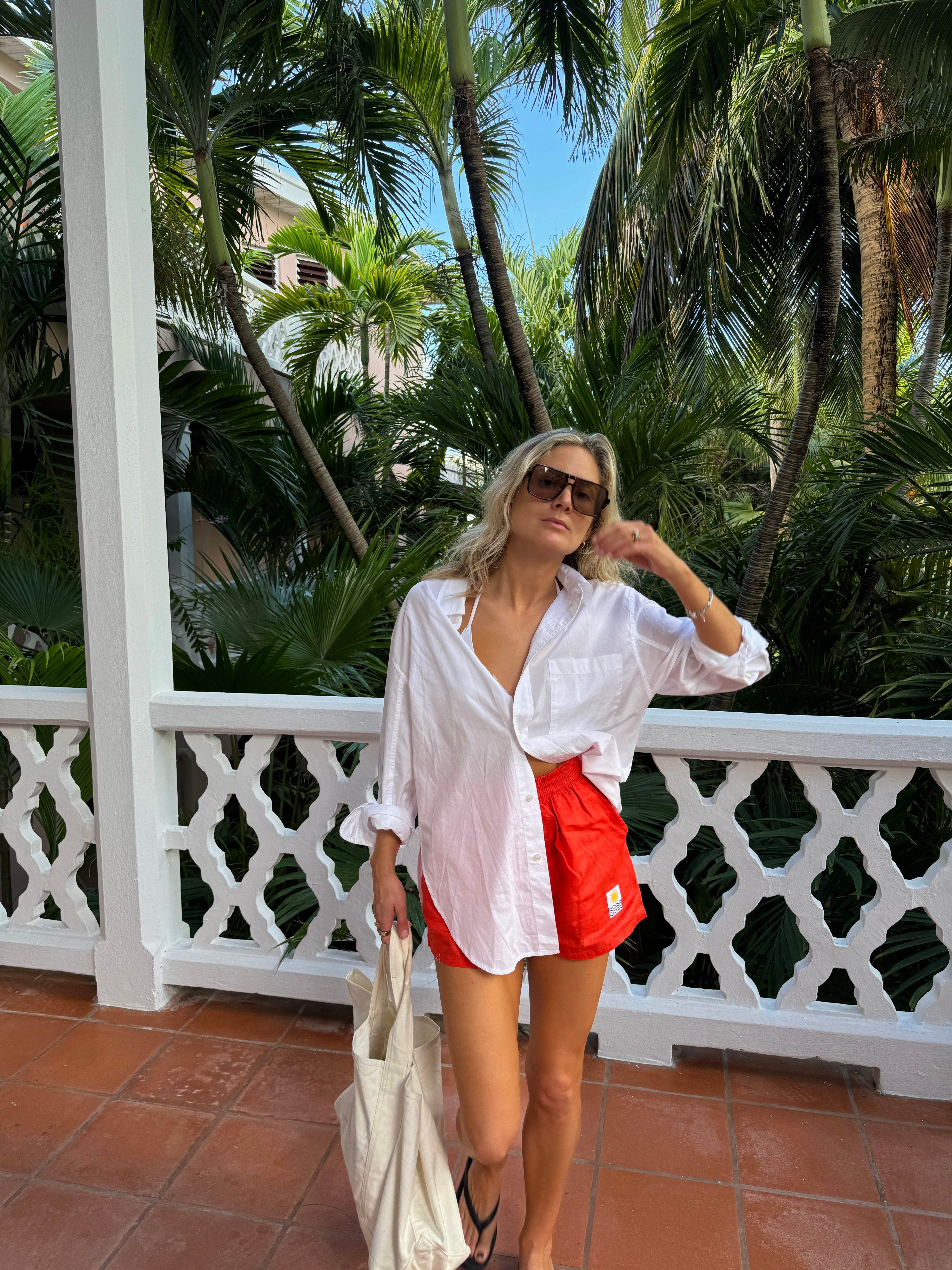 White shirt red shorts 2025