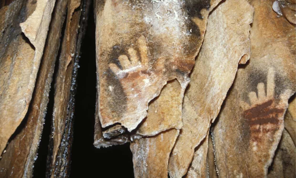 Decoding Prehistoric Handprints: A Tale of Deliberate Digit Removal