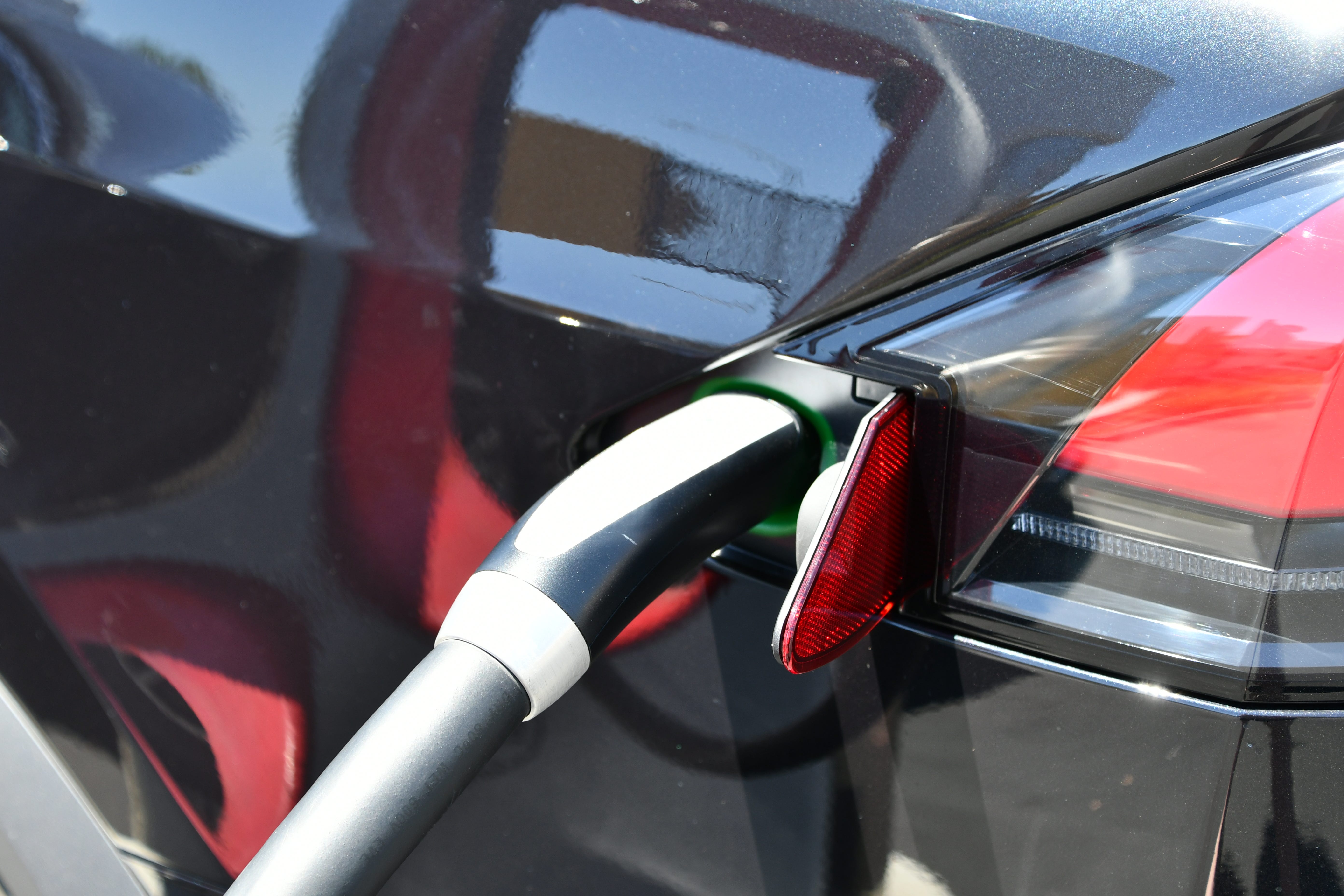 GM Ford Adopt Tesla Supercharger EV Charging Game Changer