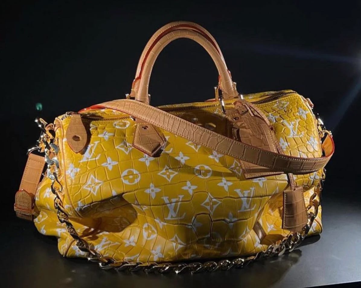 Louis vuitton bag with gold lv deals