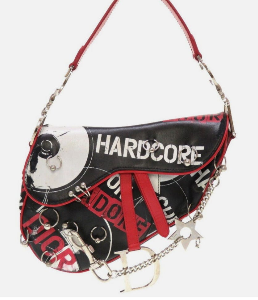 Dior pierced saddle bag best sale
