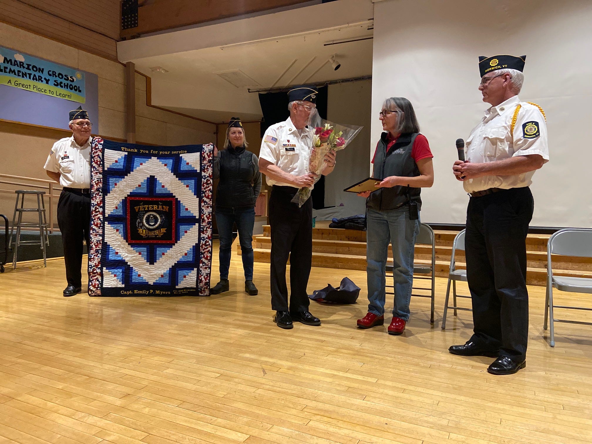 Marion Cross students perform a song in honor of a Marion Cross staff