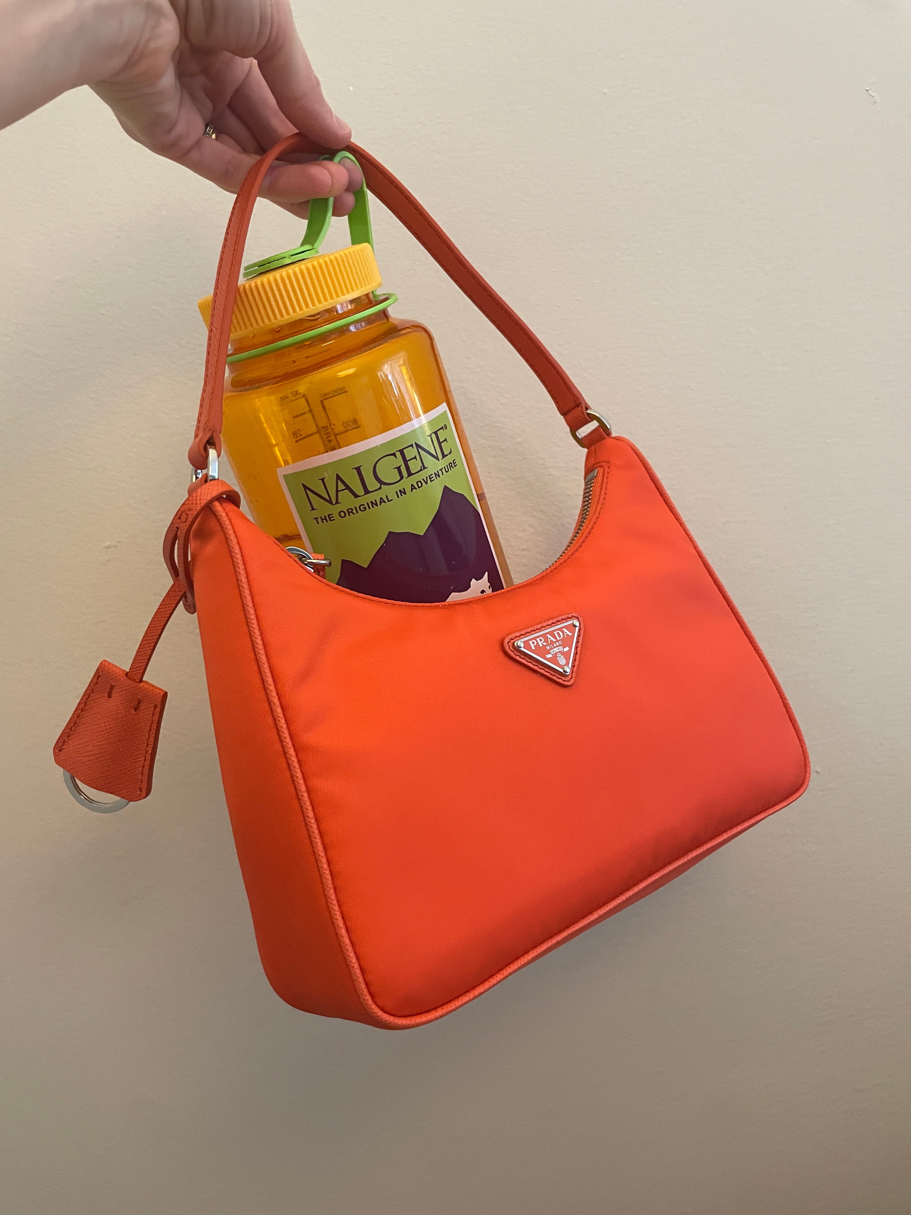 Orange prada re edition bag sale