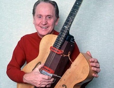 The log guitar 2025