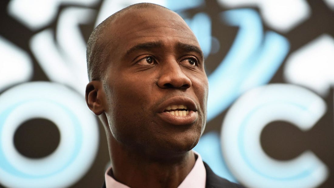Newly appointed state Surgeon General Dr. Joseph Ladapo speaks during a press conference at Neo City Academy in Kissimmee, Florida. Newly appointed state Surgeon General Dr. Joseph Ladapo speaks during a press conference at Neo City Academy in Kissimmee, Florida.