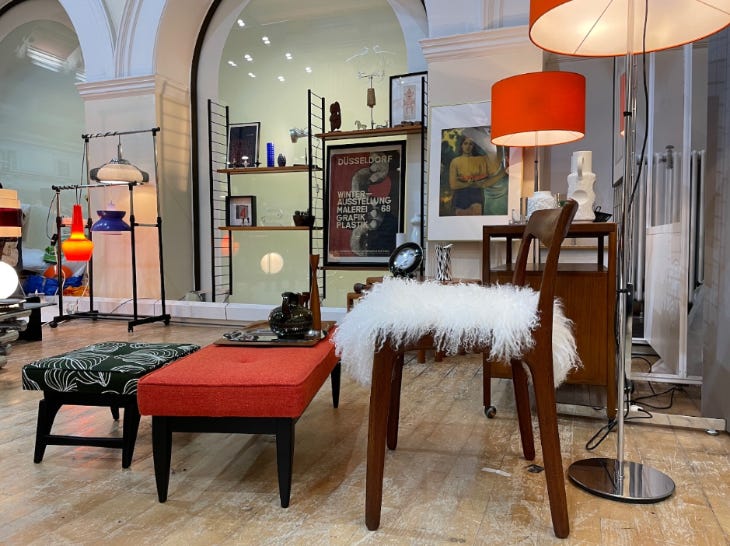 Various items of furniture and lamps on display at the So Last Century fair.