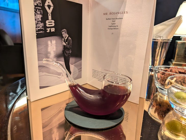 A cocktail in a glass pipe