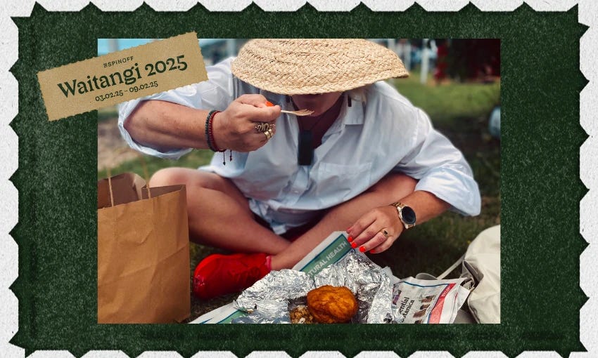 A person in a white shirt and straw hat sits on grass, eating hangi from foil wrapped in newspaper. There's a paper bag beside them. A green border surrounds the image, with a tag labeled "Waitangi 2025" at the top.