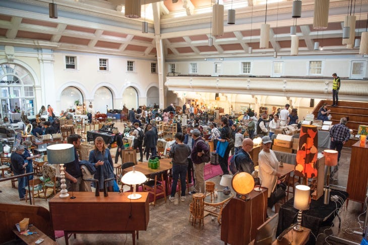 People browsing at a vintage furniture fair