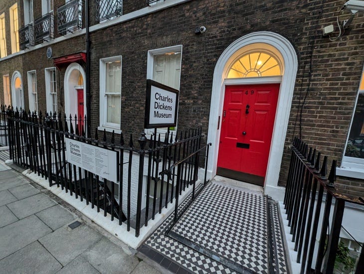 The front of the Charles Dickens Museum with bright red door