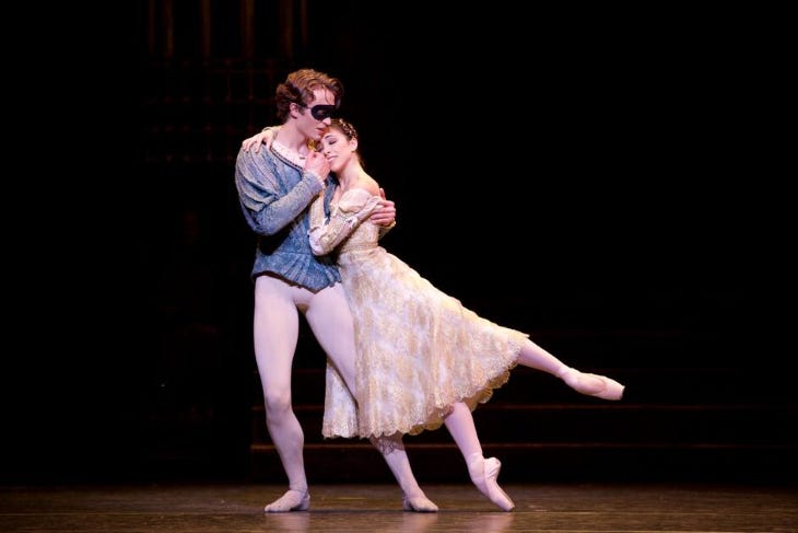Two ballet dancers dancing together in Romeo and Juliet