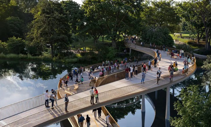Two footbridges crossing over each other above a lake