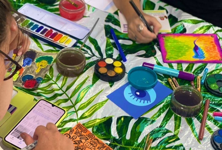 People taking part in a painting activity