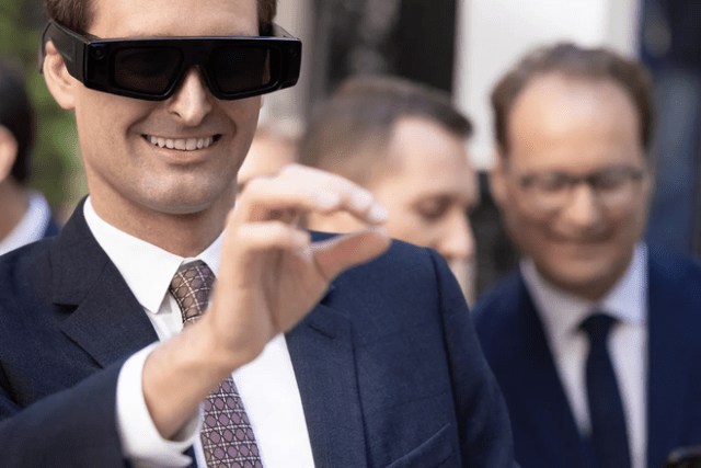 Co-founder and Chief Executive Officer of Snap Inc Evan Spiegel wears the Spectacle Augmented Reality glasses in Paris on May 19.Photographer: Joel Saget/AFP/Getty Images