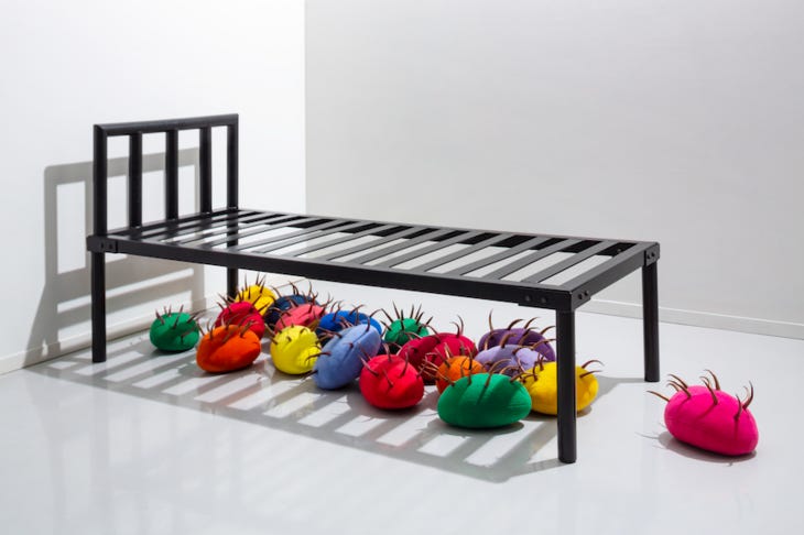 Colourful squishy things under a bed