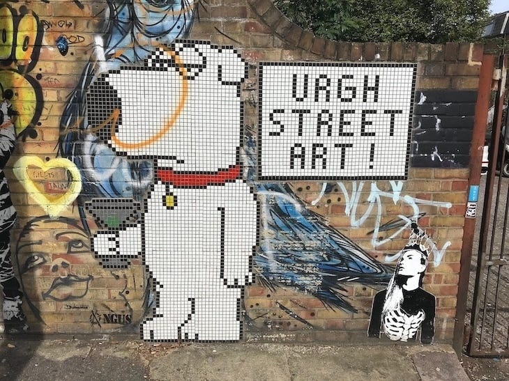 Brian the dog from Family guy in mosaic form, apparently saying urgh street art. But the joke is that he is himself a piece of street art. which is hilarious. hahaha