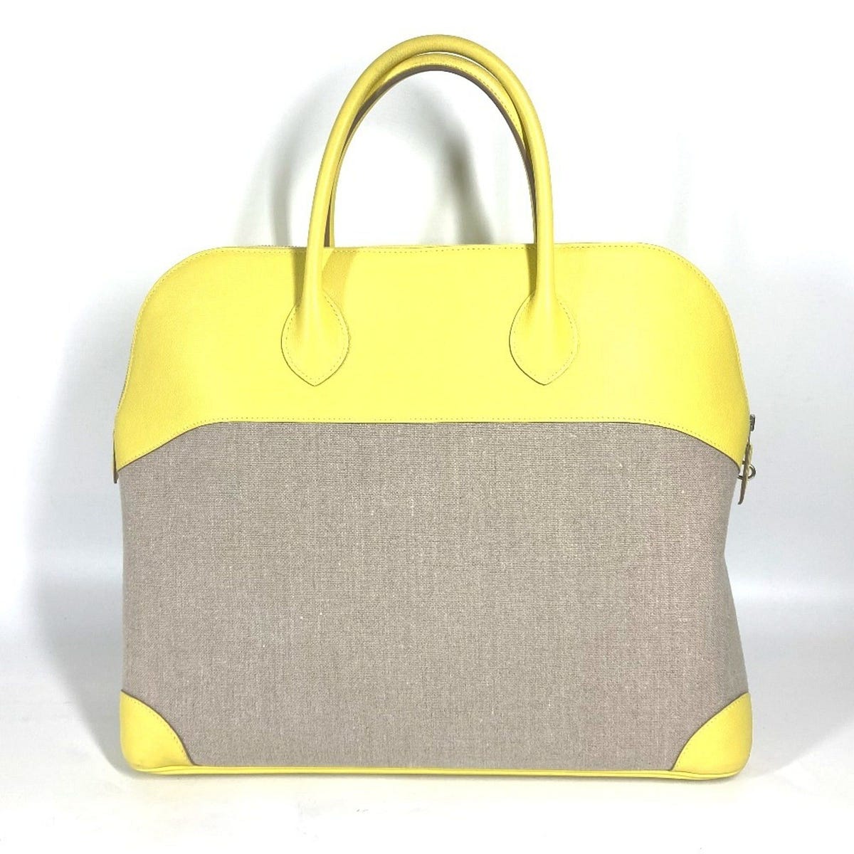Hermès Bolide 45 in yellow Swift and Toile H from eLADY on Grailed