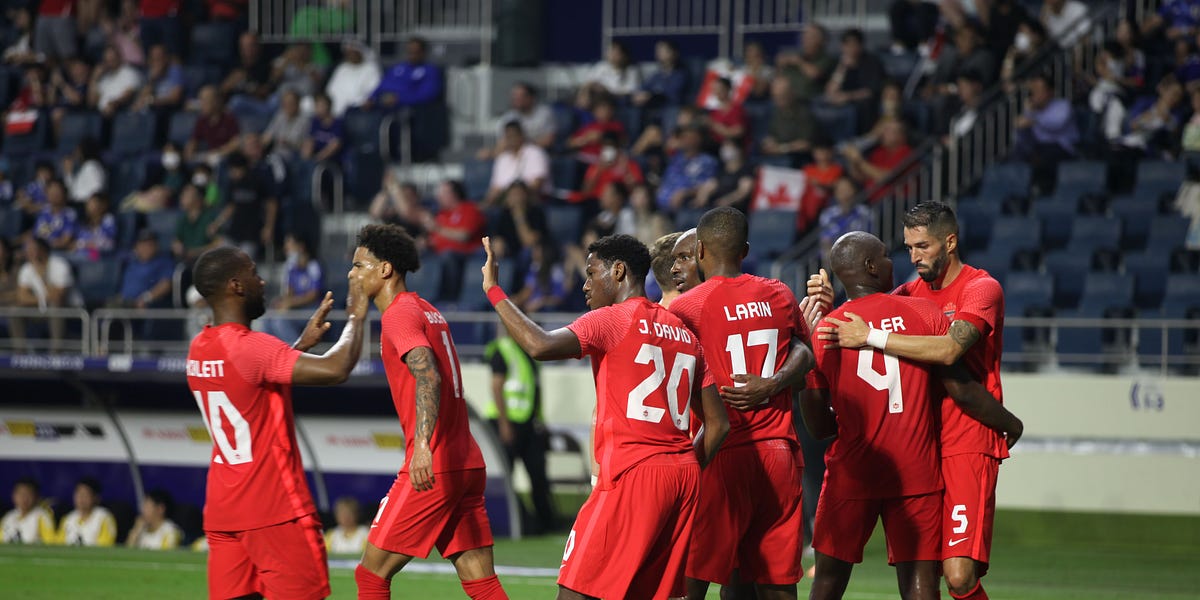 A soccer stadium bustling with fans in anticipation of the FIFA World Cup 2026