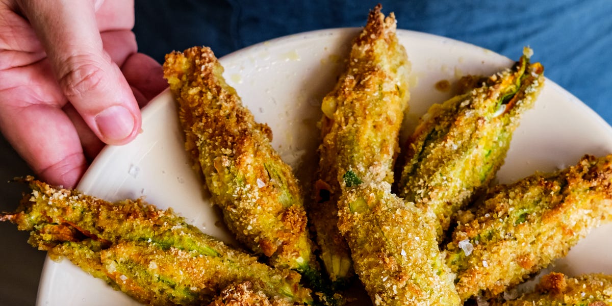 Baked stuffed squash blossoms by Giulia Scarpaleggia
